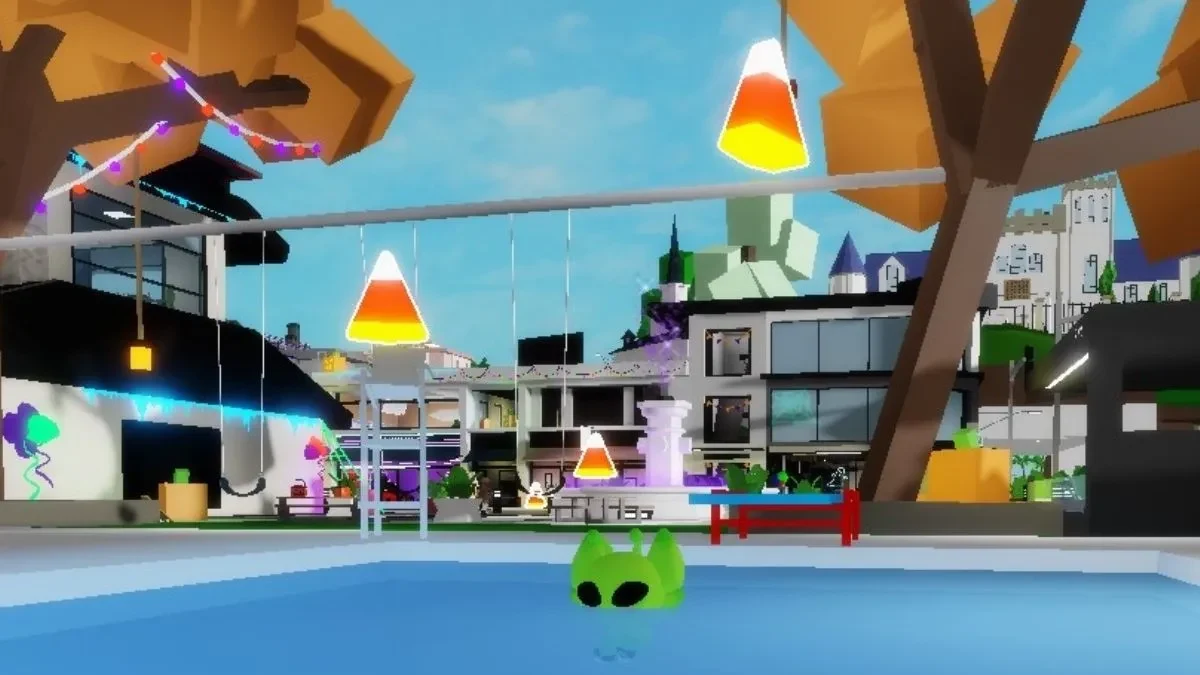 Brookhaven pool area with glowing Candy Corn above the water and near the pool deck.