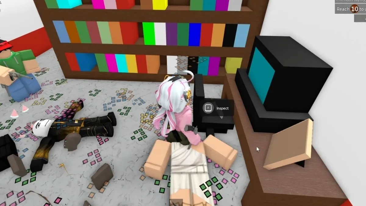 Murder Mystery 2 Hospital 2014 room with a colorful bookshelf, computer table, chair, and Inspect prompt